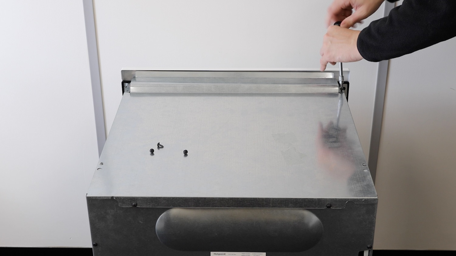 Remove screws for top oven panel
