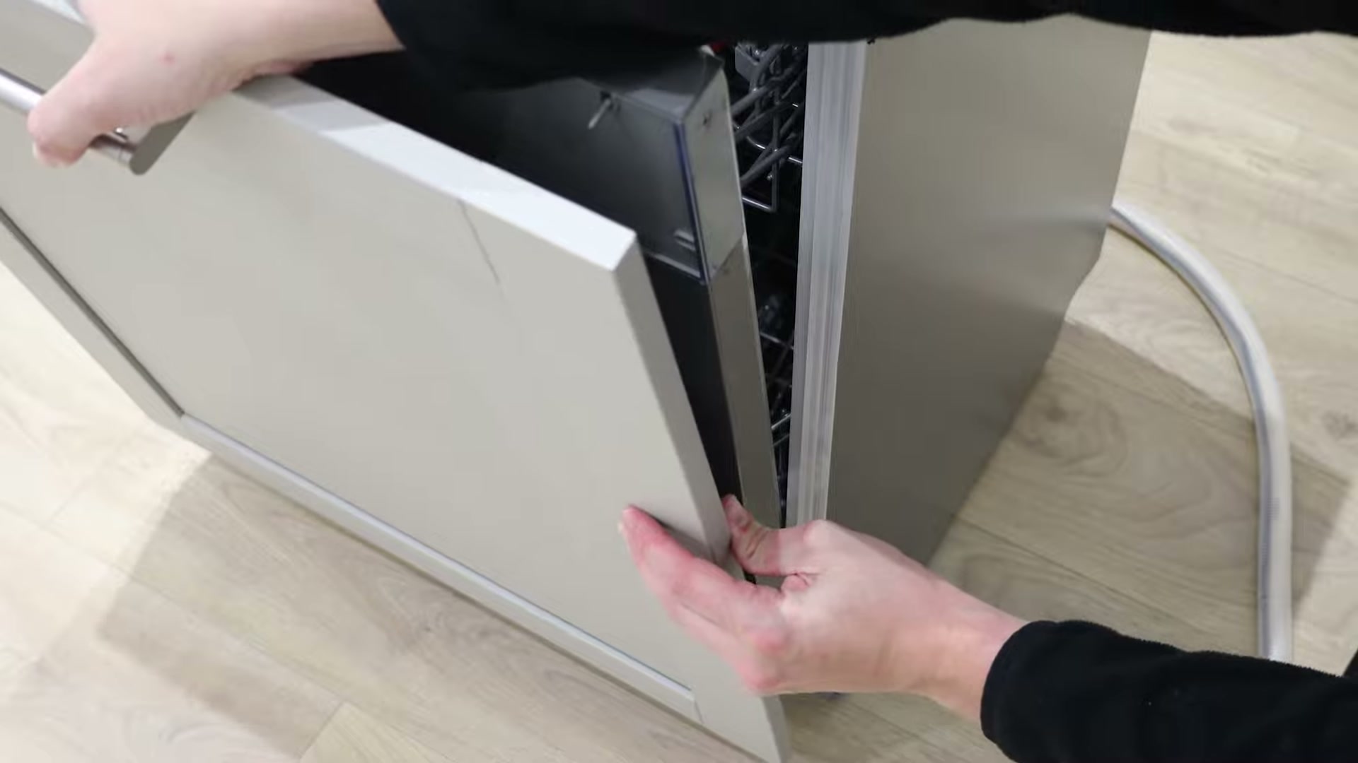 Reattaching the integrated cabinet door to a Bosch dishwasher