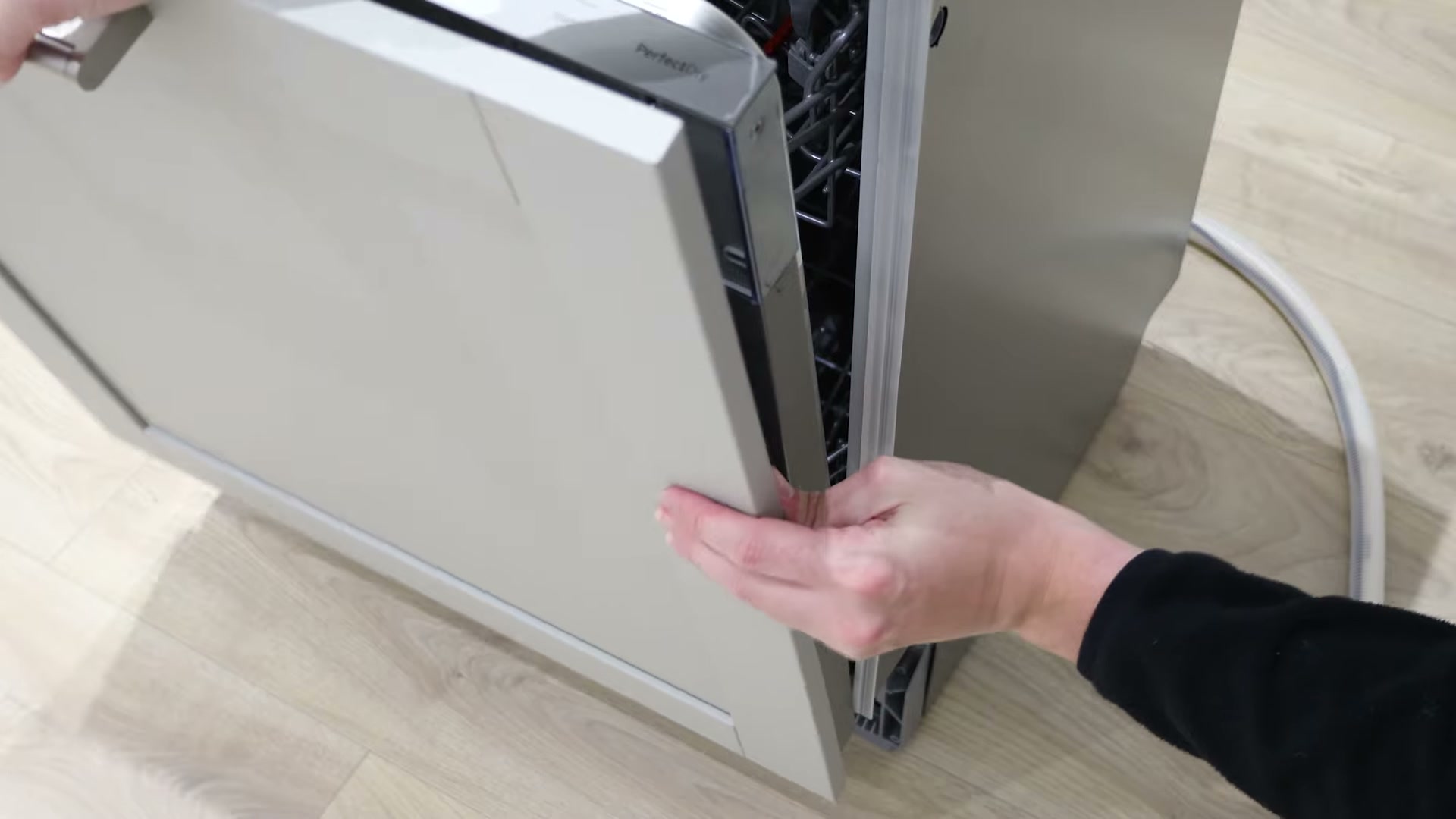 Reattaching the integrated cabinet door to a Bosch dishwasher