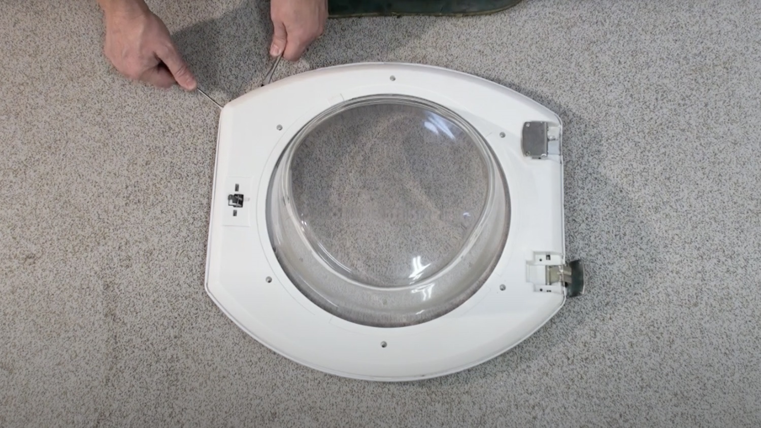 Pry door open with a flathead screwdriver