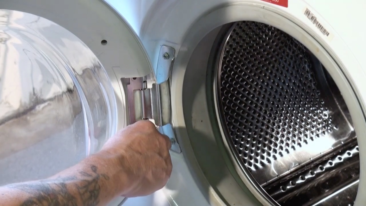 Re-attach door to the machine